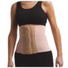 Woman wearing a beige Camp Scandinavia abdominal belt with three panels over the waist