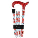Cannes Fayet Foldable Poppy Cane — folding aluminium walking cane with red poppy flowers along the shaft and a red acrylic derby handle