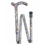 Classic Canes Autumn Gold Petite Foldable Cane — partly folded showing the smaller Petite derby handle and shaft covered in dense Autumn Gold floral pattern with blue and orange flowers on olive-green background, plus a brown rubber ferrule at the bottom end