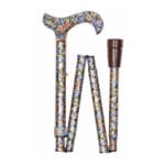 Classic Canes Autumn Gold Foldable Cane — partly folded showing the derby handle and shaft fully covered in a colourful flower pattern of blue, orange and white blooms on olive-green, with a brown rubber ferrule at one end