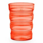 Vitility Sure Grip ergonomic drinking glass with horizontal ridges in orange