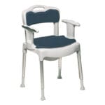 Etac Swift Commode Chair — white plastic four-leg chair with arched cut-out white backrest, two white armrests, dark blue padded seat cushion and matching blue back cushion, on height-adjustable aluminium legs