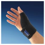 Black Mediroyal NRX thumb orthosis worn on an open hand with the wrist band fastened