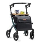 Bamboo tray fitted to a green Rollz rollator carrying a mug and a juice carton
