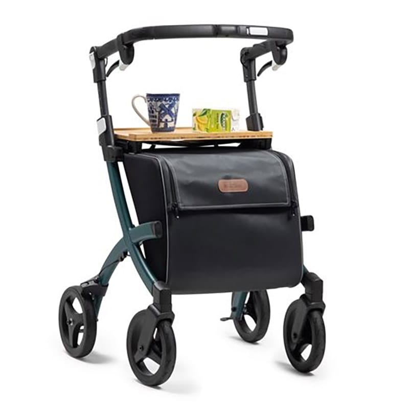 Bamboo tray fitted to a green Rollz rollator carrying a mug and a juice carton