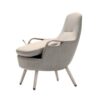 Beige Trust Care Lets Sit Up chair with the seat tilted forward by the gas spring