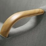 Trust Care Lets Sit Up - grey chair, armrest handle close-up Trust Care Lets Sit Up sit-to-stand chair in grey, armrest handle close-up