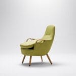 Trust Care Lets Sit Up - green chair, with the seat tilted up Trust Care Lets Sit Up sit-to-stand chair in green, with the seat tilted up