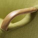 Trust Care Lets Sit Up - green chair, armrest handle close-up Trust Care Lets Sit Up sit-to-stand chair in green, armrest handle close-up
