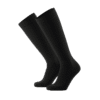 Pair of black knee-length Trust Care compression stockings standing upright