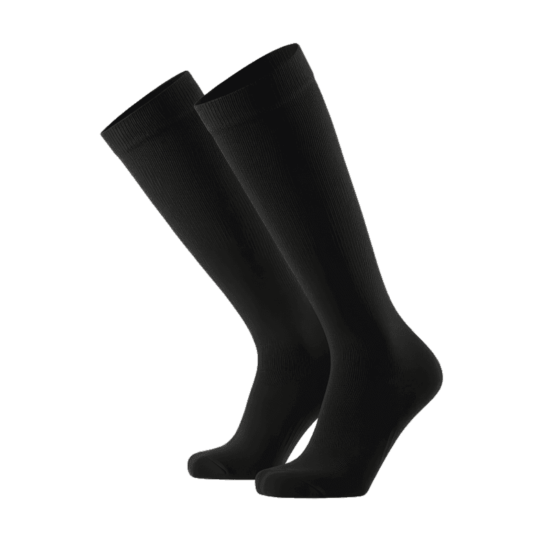 Pair of black knee-length Trust Care compression stockings standing upright