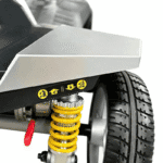 Front wheel with suspension Close-up of the front wheel with yellow suspension and puncture-free solid tyre