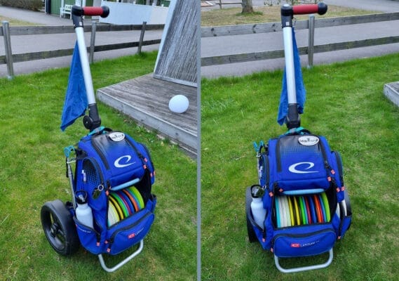 Blue disc golf bag strapped to an Andersen Tura chassis on grass, seen from two angles