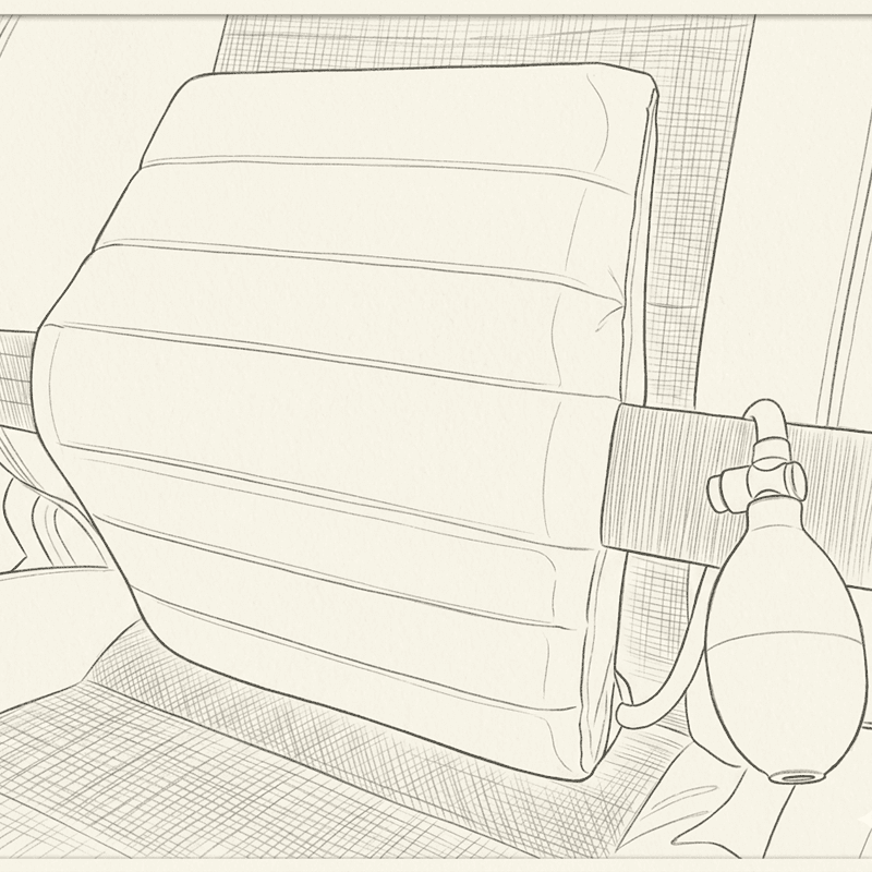 Illustration of the cushion strapped to a car seat with the pump hanging at the side