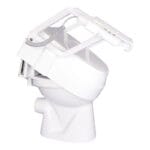 Drive eTSE toilet stand-up aid with tilted seat, armrests and remote control fitted on a white toilet