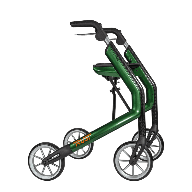 Lets Be Free carbon fibre rollator in green Lets Be Free carbon fibre rollator in green seen from the side, a folding rollator with seat
