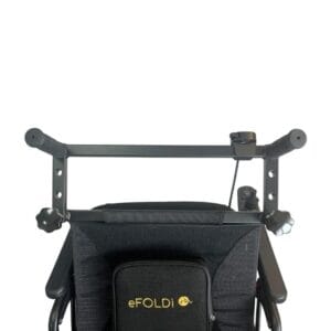 eFOLDi Navigator handle extension fitted on the backrest with the attendant control on the bar