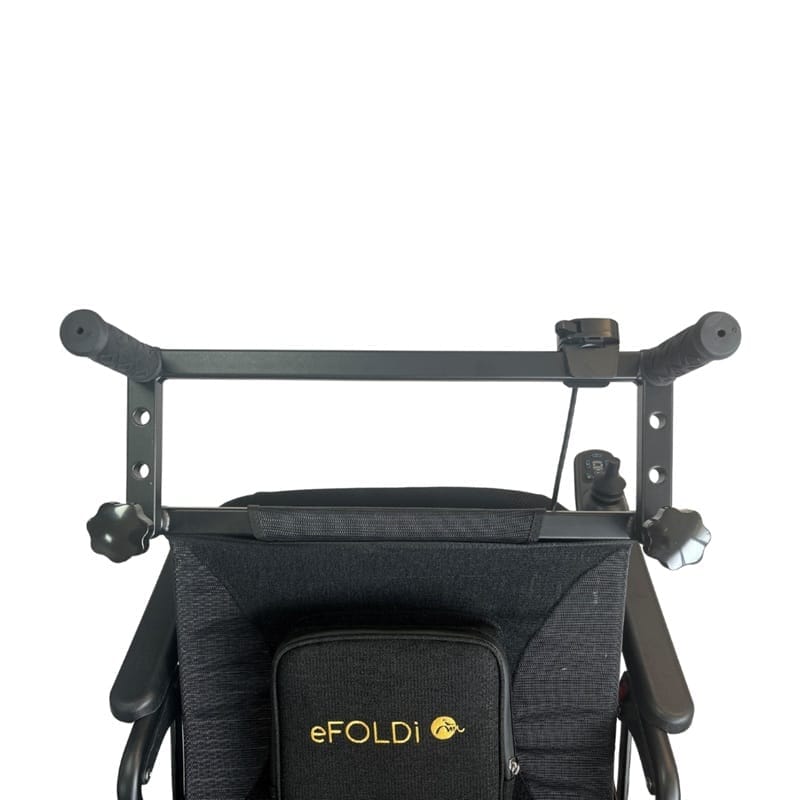 eFOLDi Navigator handle extension fitted eFOLDi Navigator handle extension fitted on the backrest with the attendant control on the bar